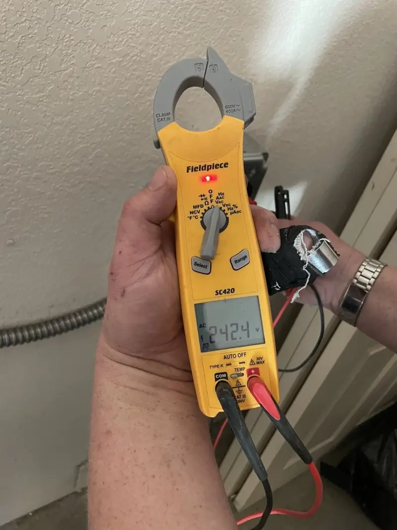 Voltage testing with clamp meter during Generator Installation in Ledyard